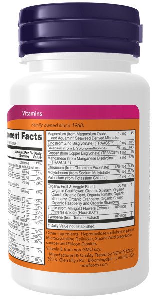 A bottle of vitamin supplement with ingredients listed.