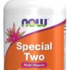 A bottle of multi vitamin with pink flowers.