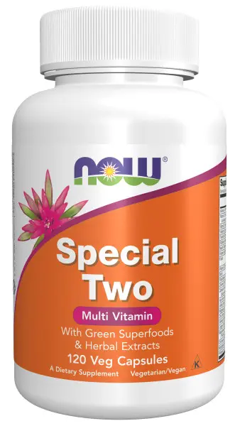 A bottle of multi vitamin with pink flowers.