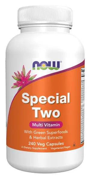 A bottle of special two multi vitamin with green superfoods.