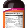 A bottle of vitamin water with the label for supplement facts.