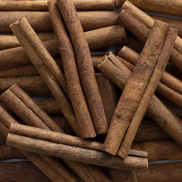 A pile of cigars sitting on top of each other.