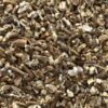 A close up of the top of a pile of wood shavings